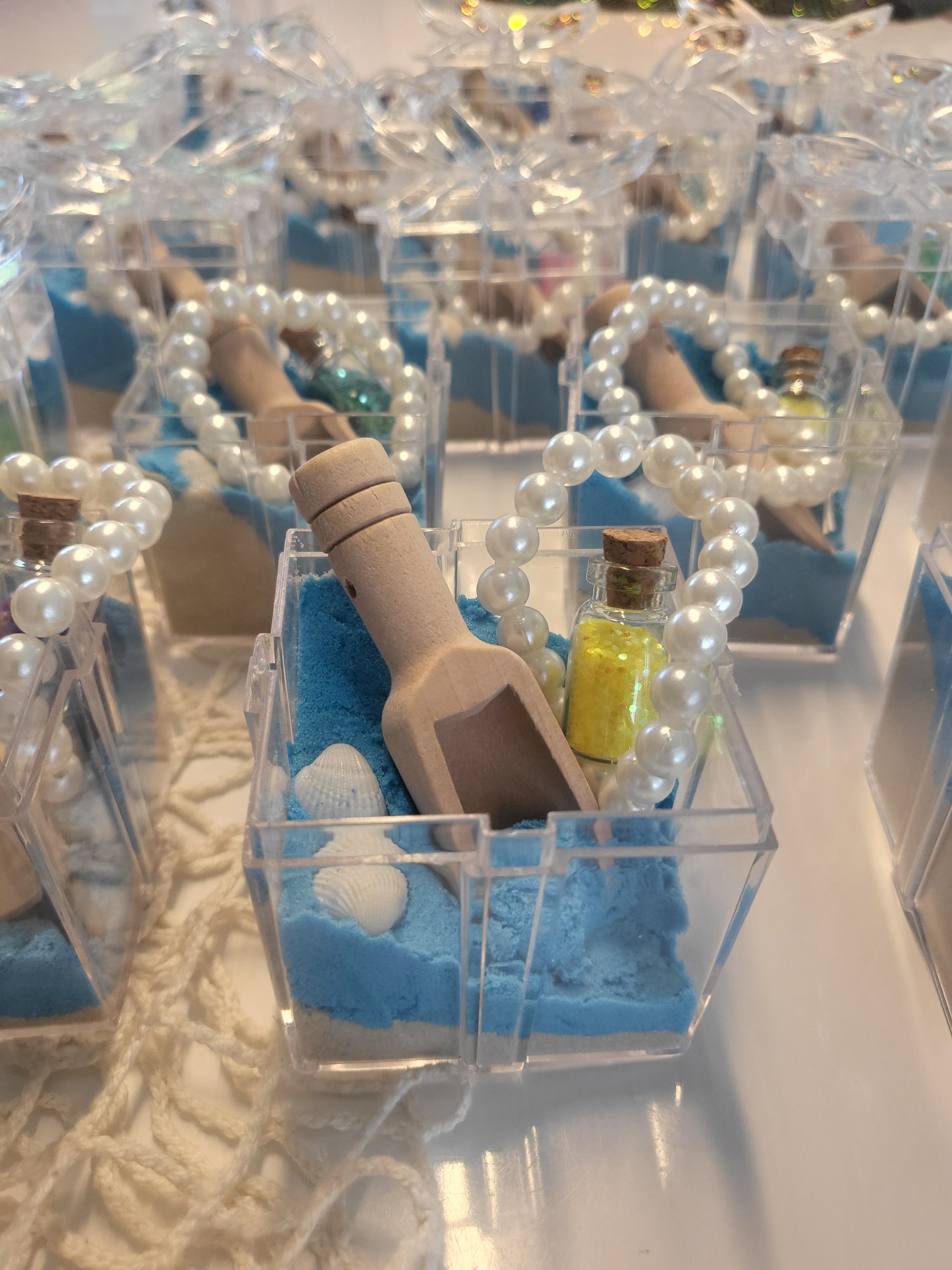 Childrens unique party favor, under the sea sensory playdough kinetic sand with sea shells. scoop to dig for treasure